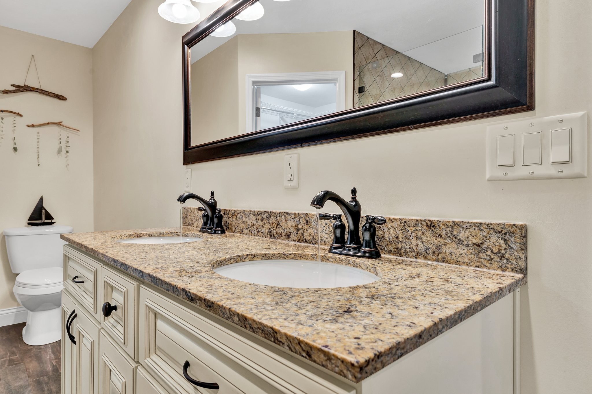 1600 Union Road Southeast Cleveland, TN 37323 - Photo 34 of 68 a bathroom with a granite countertop sink and a mirror