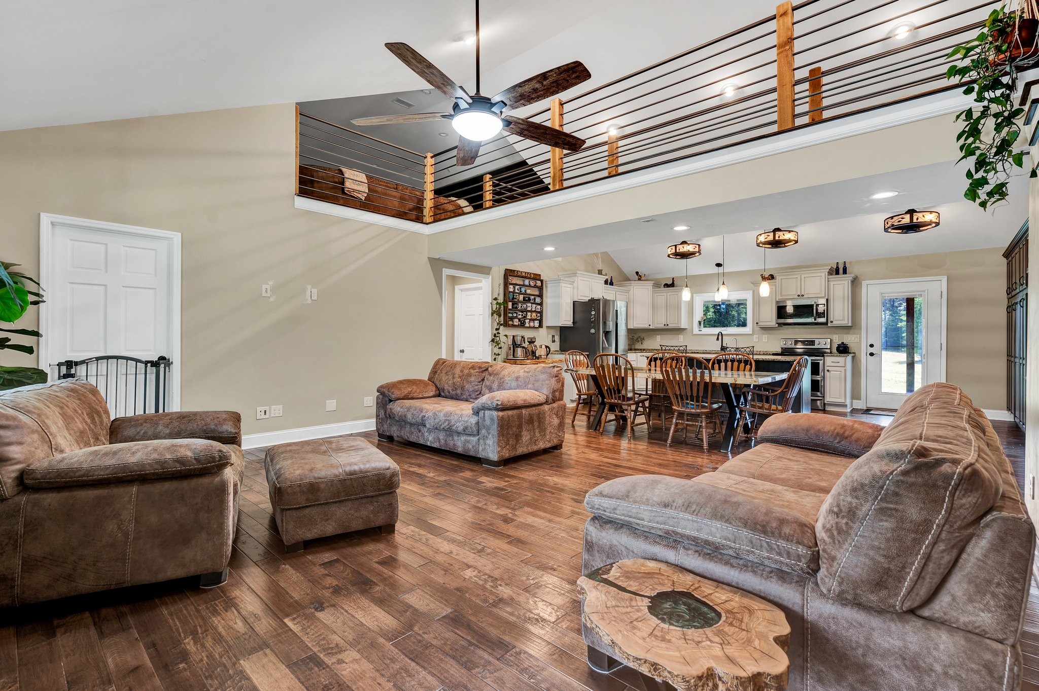 1600 Union Road Southeast Cleveland, TN 37323 - Photo 38 of 68 a living room with furniture kitchen view and a chandelier