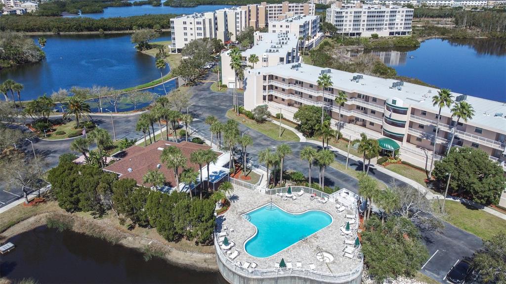6399 Shoreline Drive, Unit 4206 St. Petersburg, FL 33708 - Photo 31 of 40 an aerial view of a house with a lake view