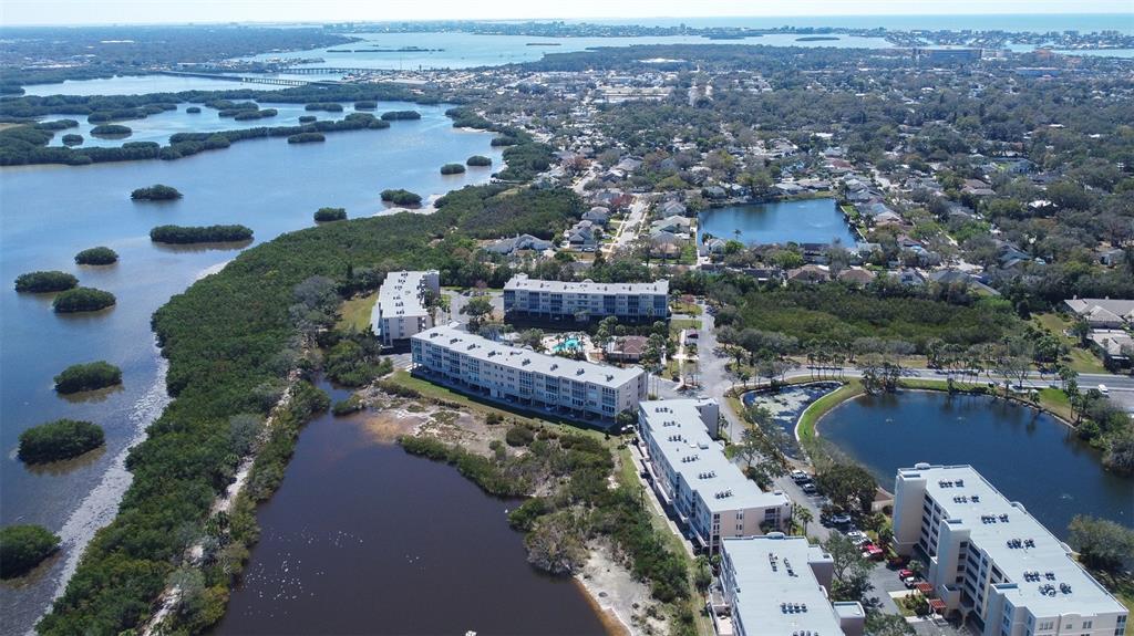 6399 Shoreline Drive, Unit 4206 St. Petersburg, FL 33708 - Photo 37 of 40 aerial view of a city with lots of residential buildings