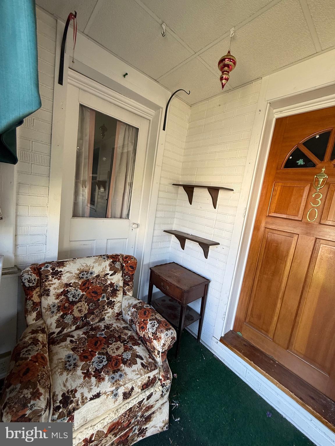 30 Frederick Road Thurmont, MD 21788 - Photo 20 of 58 a bedroom with a bed and wooden floor