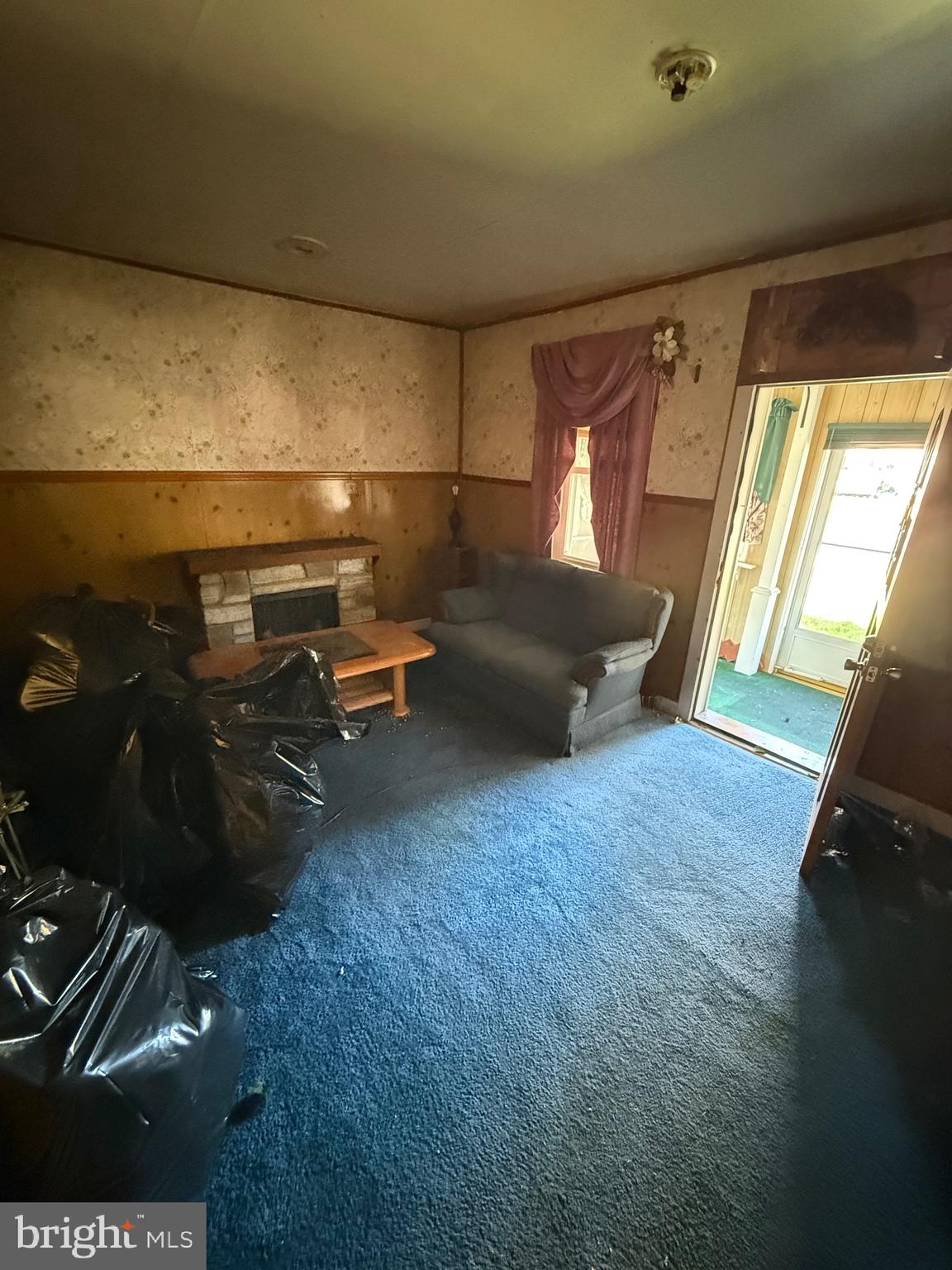 30 Frederick Road Thurmont, MD 21788 - Photo 25 of 58 a living room with furniture and a fireplace