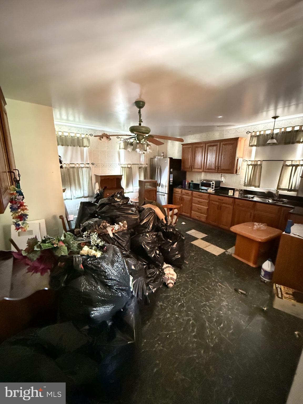 30 Frederick Road Thurmont, MD 21788 - Photo 26 of 58 a living room with lots of furniture and a kitchen view
