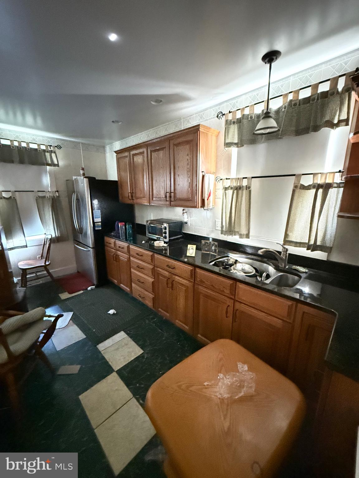 30 Frederick Road Thurmont, MD 21788 - Photo 27 of 58 a kitchen with stainless steel appliances granite countertop a sink a stove top oven a counter space and cabinets