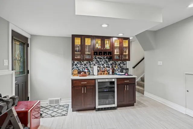 a room with a wooden floor and furniture