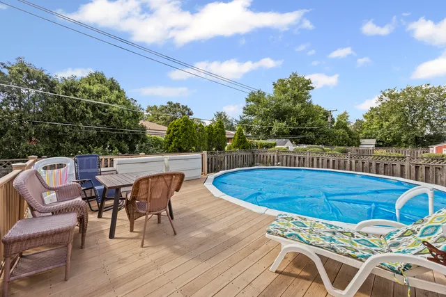 a view of a swimming pool with a patio