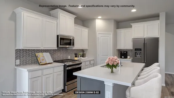 a kitchen with stainless steel appliances granite countertop a white refrigerator a stove a microwave a sink and white cabinets