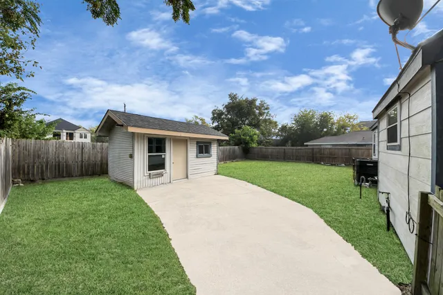 a front view of a house with yard