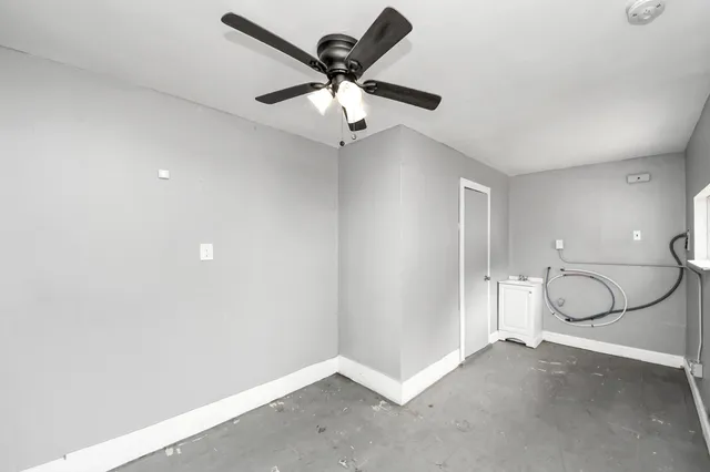 a view of a room with a fan