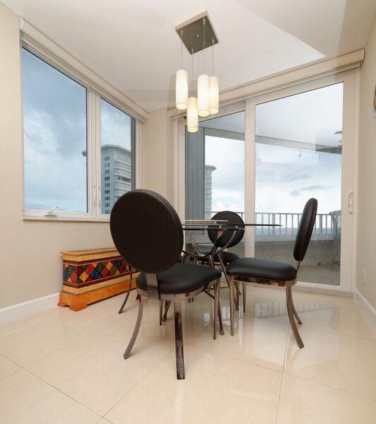 550 South Ocean Boulevard, Unit 1201 Boca Raton, FL 33432 - Photo 10 of 37 BREAKFAST AREA WITH VIEWS OF LAKE BOCA A