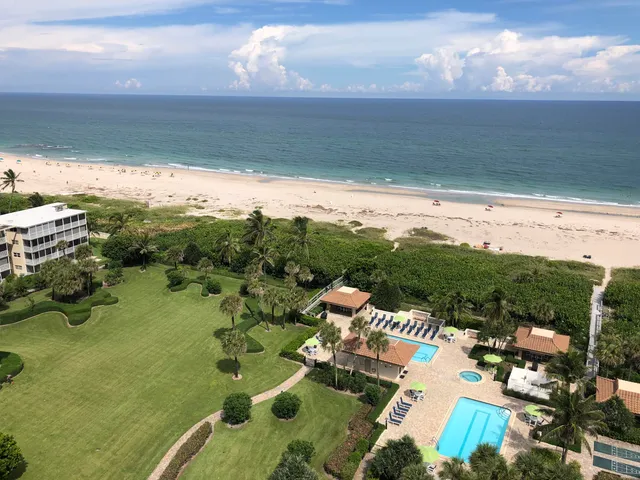 a view of a lake with a yard