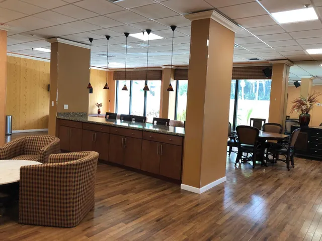 a view of a dining room with furniture