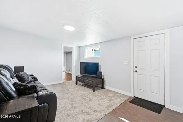 a workspace with furniture and a window