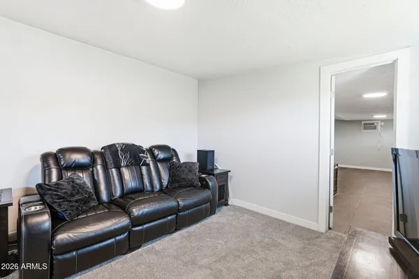 a view of workspace and bedroom