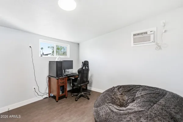 a kitchen with cabinets stainless steel appliances and a counter space