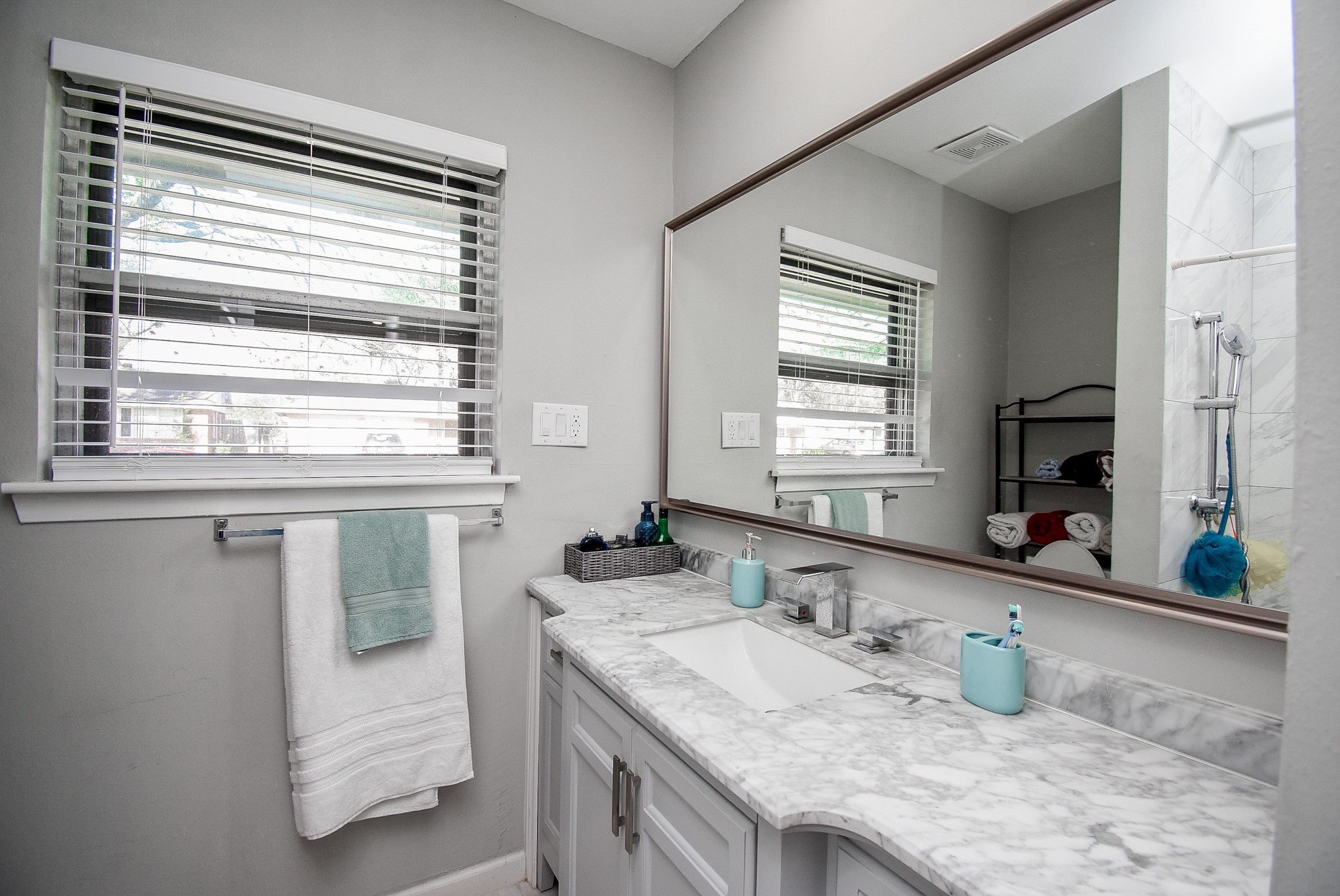 6817 Hendon Lane Houston, TX 77074 - Photo 21 of 30 a bathroom with a granite countertop sink and a mirror