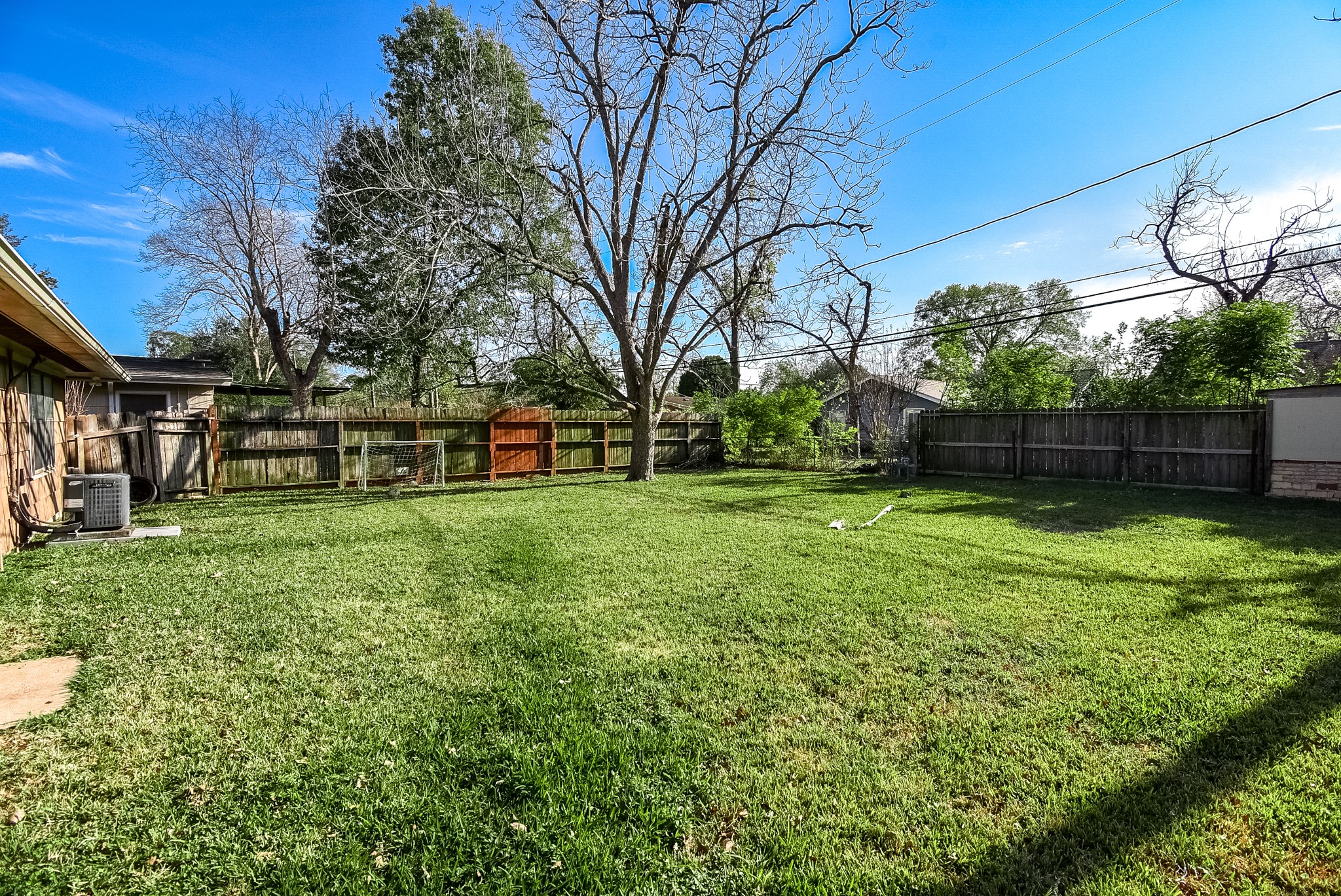 6817 Hendon Lane Houston, TX 77074 - Photo 27 of 30 a view of a house with a back yard