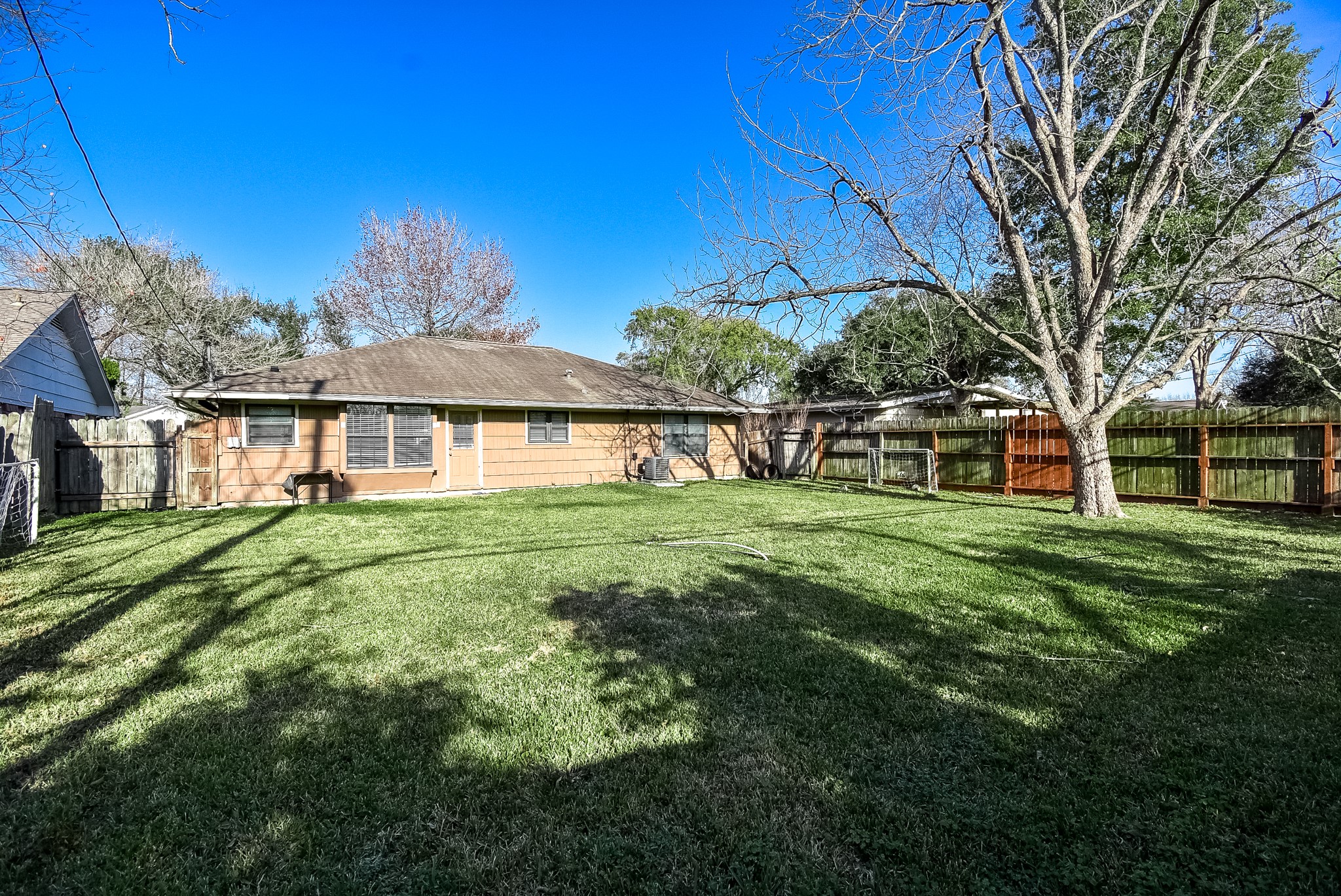 6817 Hendon Lane Houston, TX 77074 - Photo 28 of 30 a view of a house with a big yard
