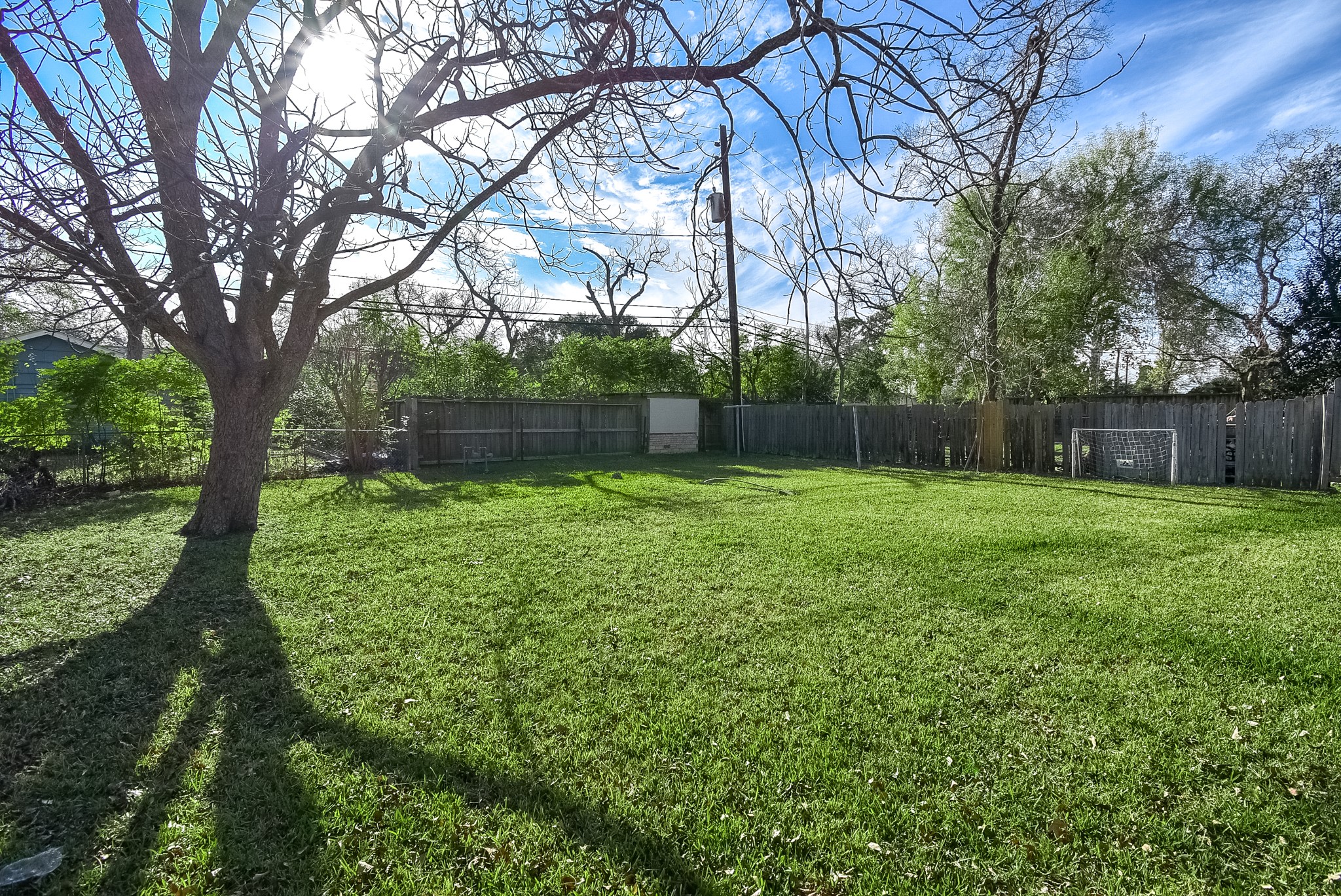 6817 Hendon Lane Houston, TX 77074 - Photo 29 of 30 a backyard of a house with lots of green space
