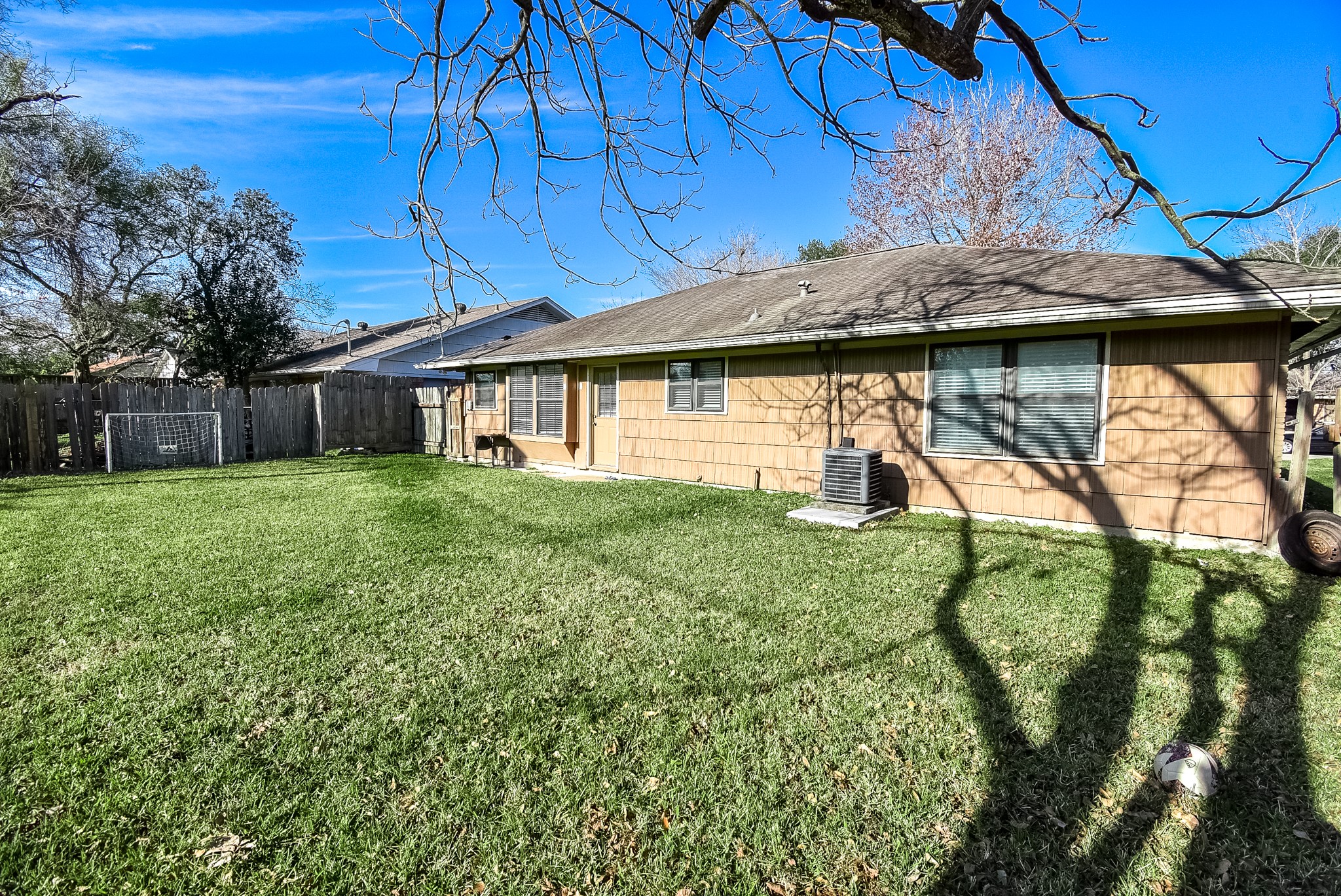 6817 Hendon Lane Houston, TX 77074 - Photo 30 of 30 a view of a house with a yard