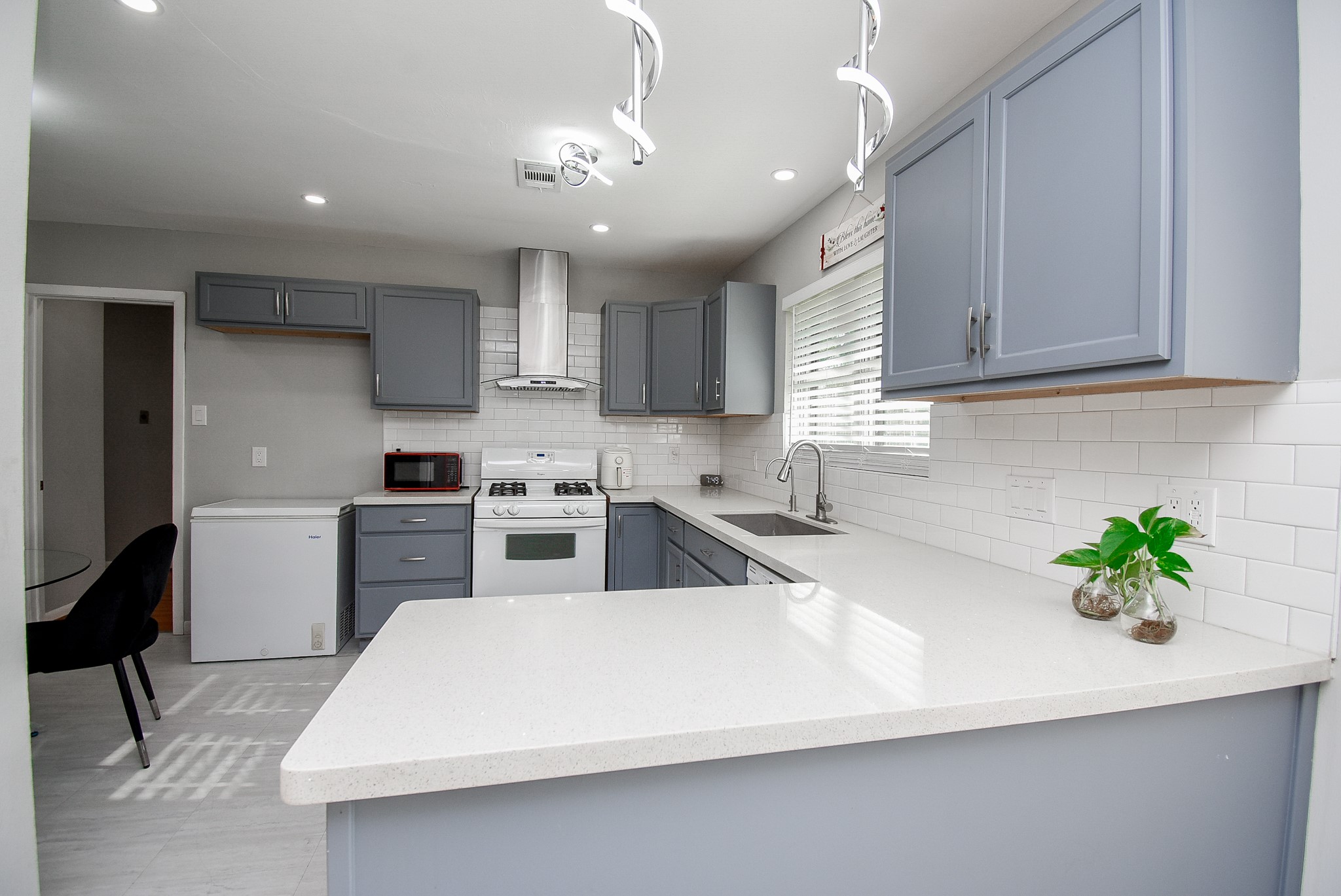 6817 Hendon Lane Houston, TX 77074 - Photo 8 of 30 a kitchen with a refrigerator and a sink