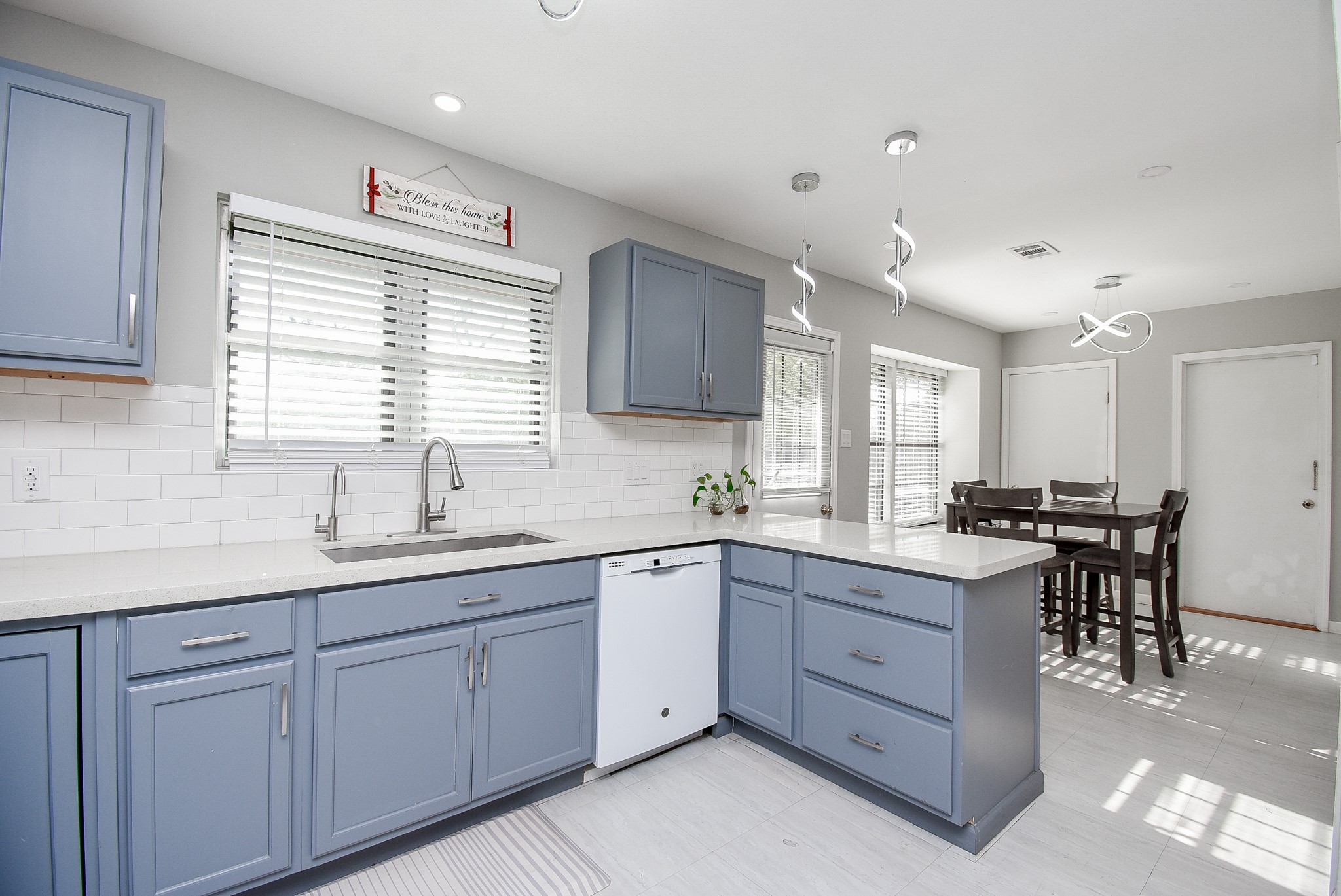 6817 Hendon Lane Houston, TX 77074 - Photo 9 of 30 a kitchen with sink stove and cabinets