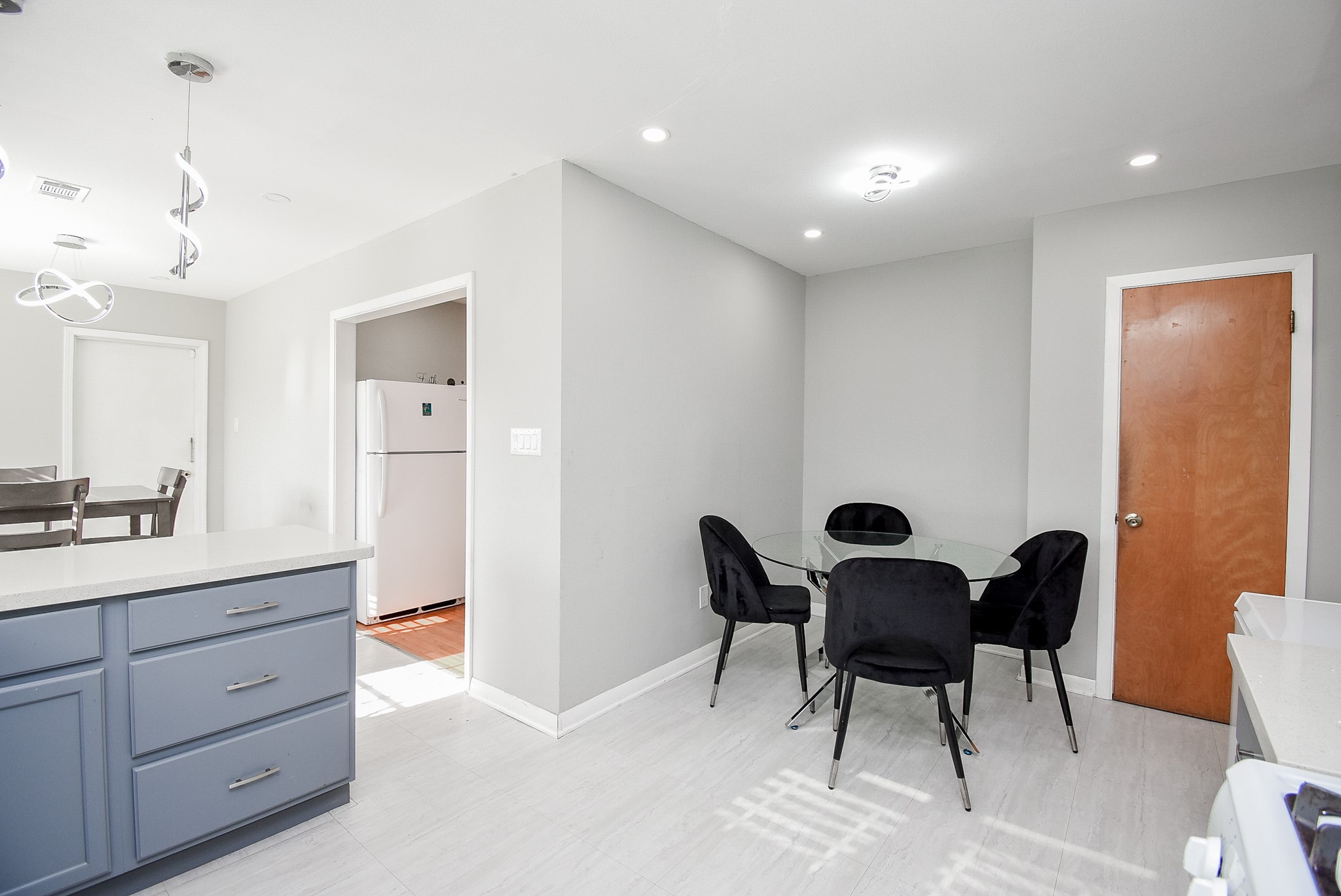 6817 Hendon Lane Houston, TX 77074 - Photo 10 of 30 a view of a dining room with furniture and wooden floor