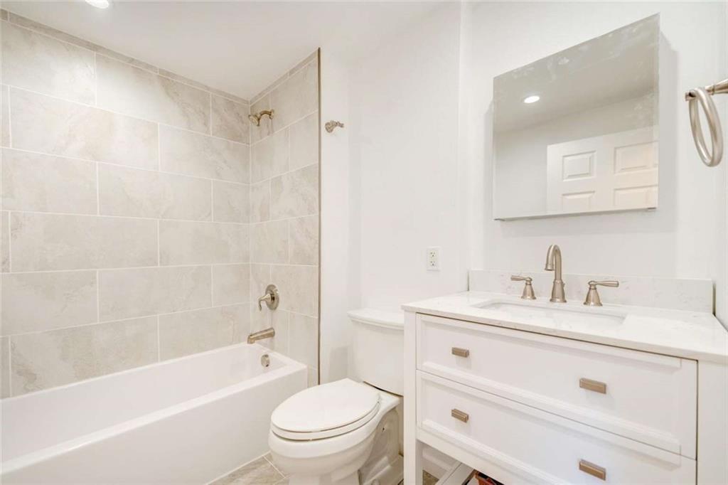 476 Peach Way Irwin, PA 15642 - Photo 22 of 25 a bathroom with a sink a toilet and a bathtub