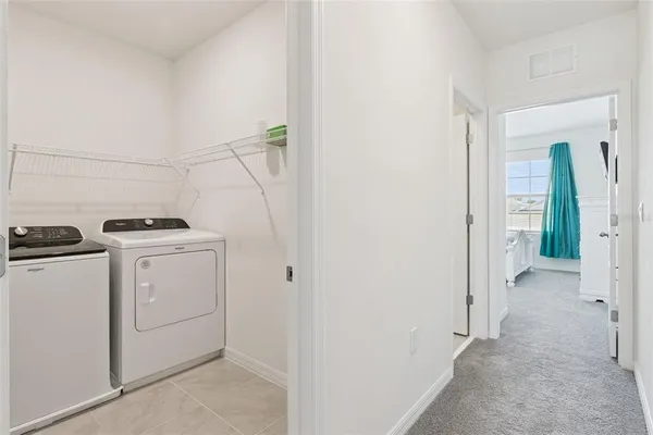 a view of a storage & utility room with storage