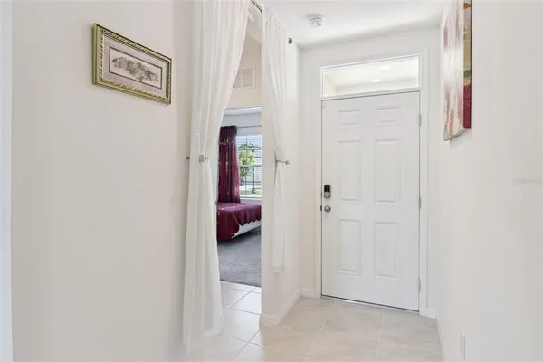 a view of a hallway with closet