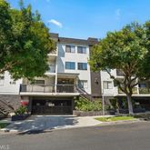 a front view of a building with street view