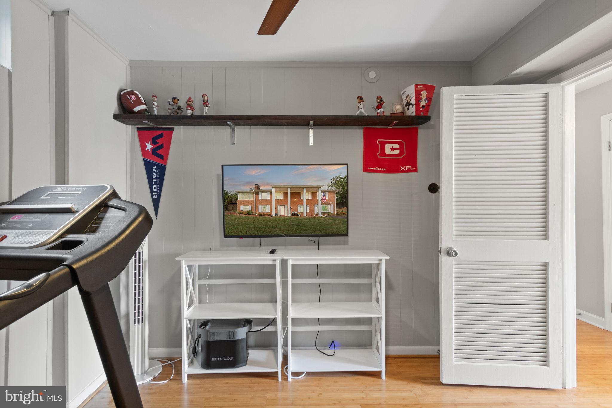 6700 Bulkley Road Lorton, VA 22079 - Photo 33 of 62 a front view of a house with dishwasher and a flat screen tv