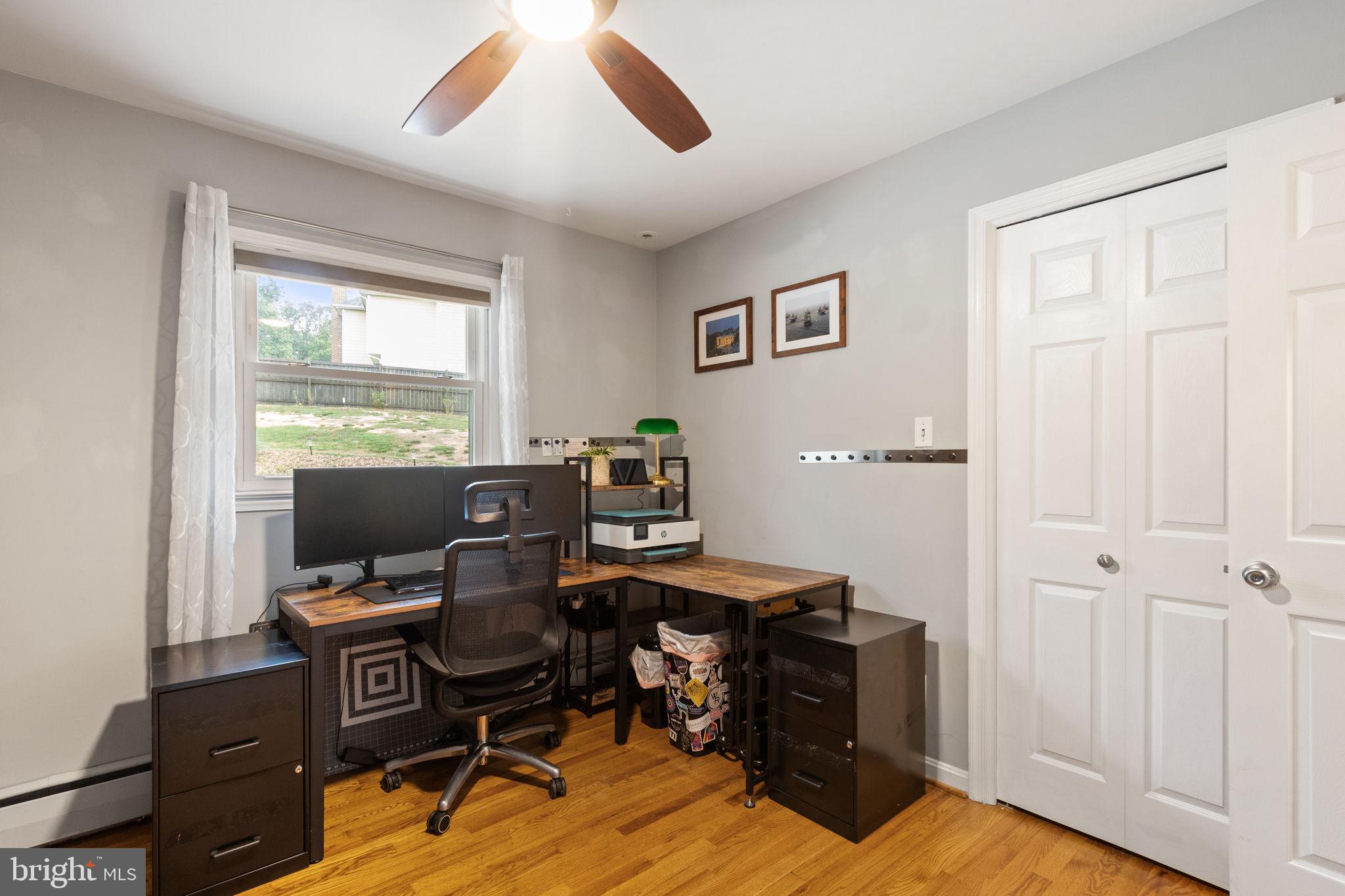 6700 Bulkley Road Lorton, VA 22079 - Photo 35 of 62 a view of a workspace with furniture and a window