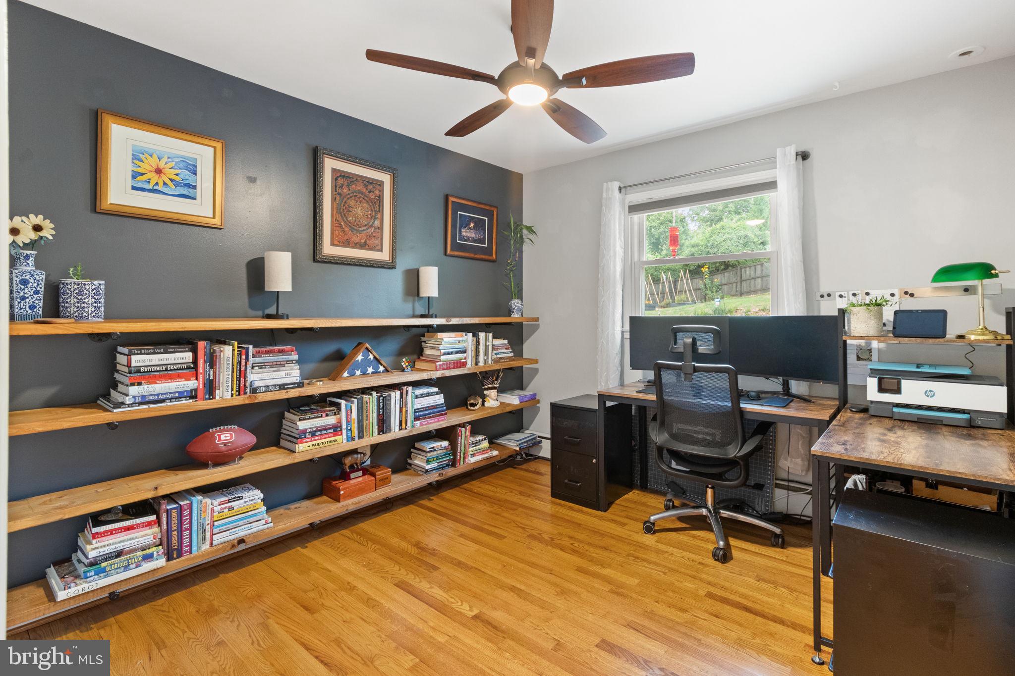 6700 Bulkley Road Lorton, VA 22079 - Photo 36 of 62 a reading room with furniture book shelf and a window