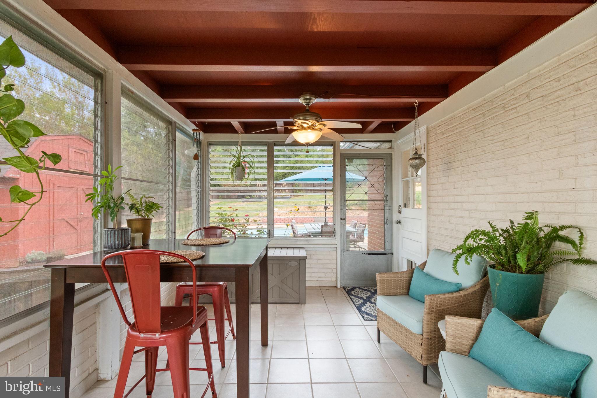 6700 Bulkley Road Lorton, VA 22079 - Photo 47 of 62 a dining room with furniture window and outside view