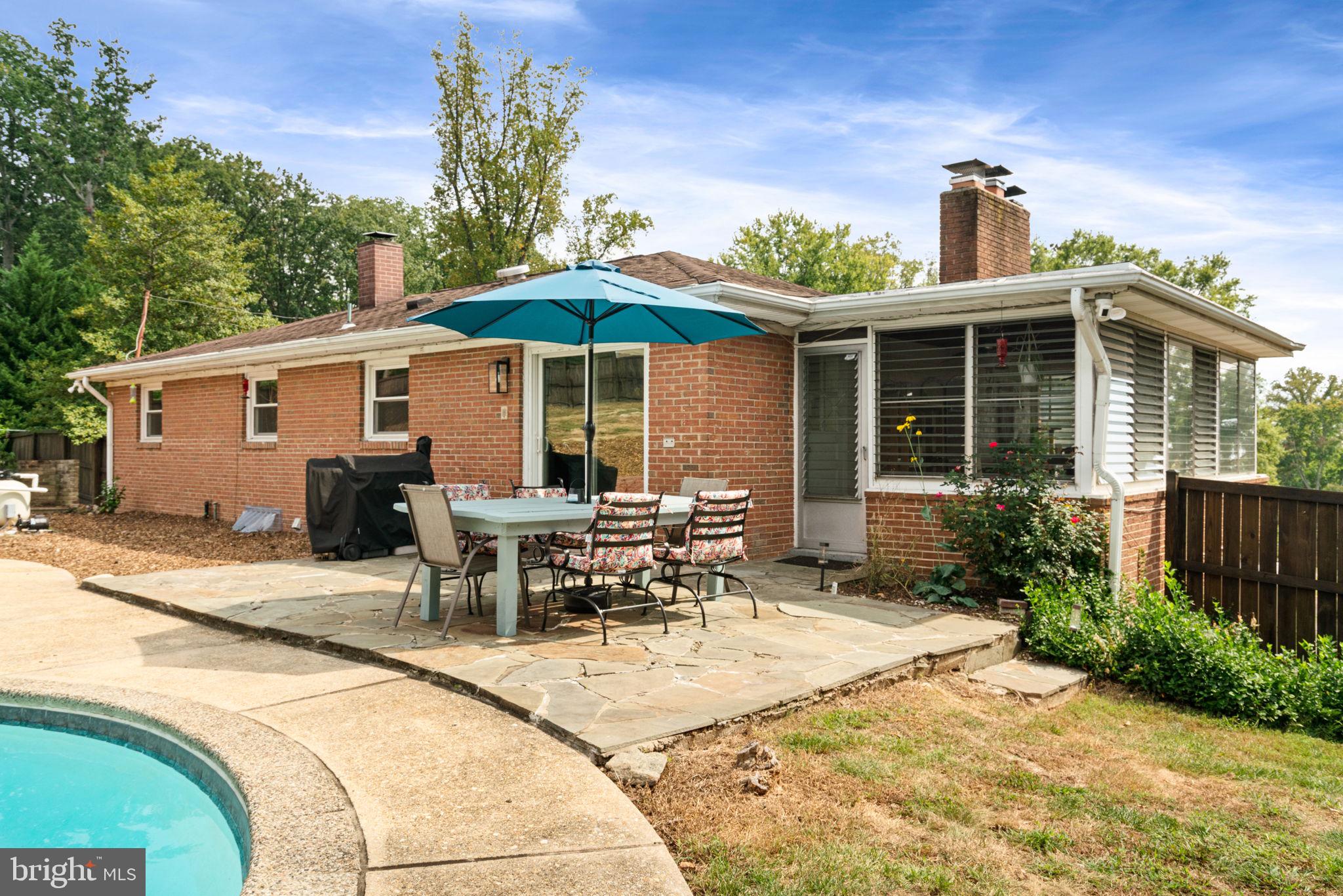 6700 Bulkley Road Lorton, VA 22079 - Photo 50 of 62 a view of a house with patio