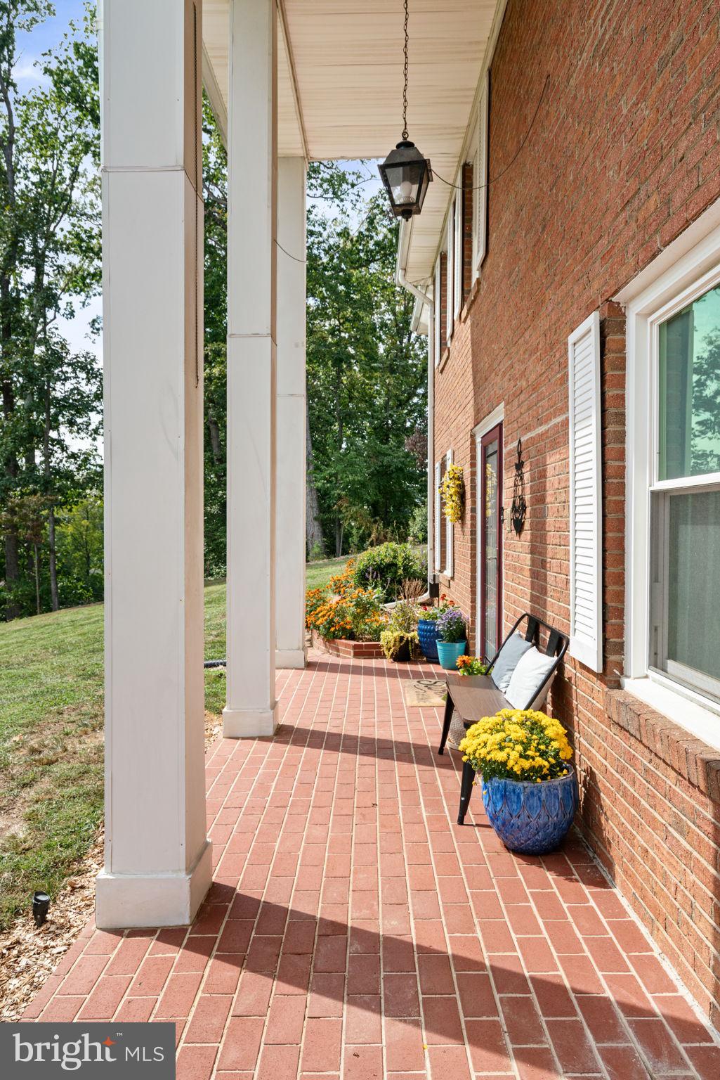 6700 Bulkley Road Lorton, VA 22079 - Photo 6 of 62 a backyard of a house with seating space