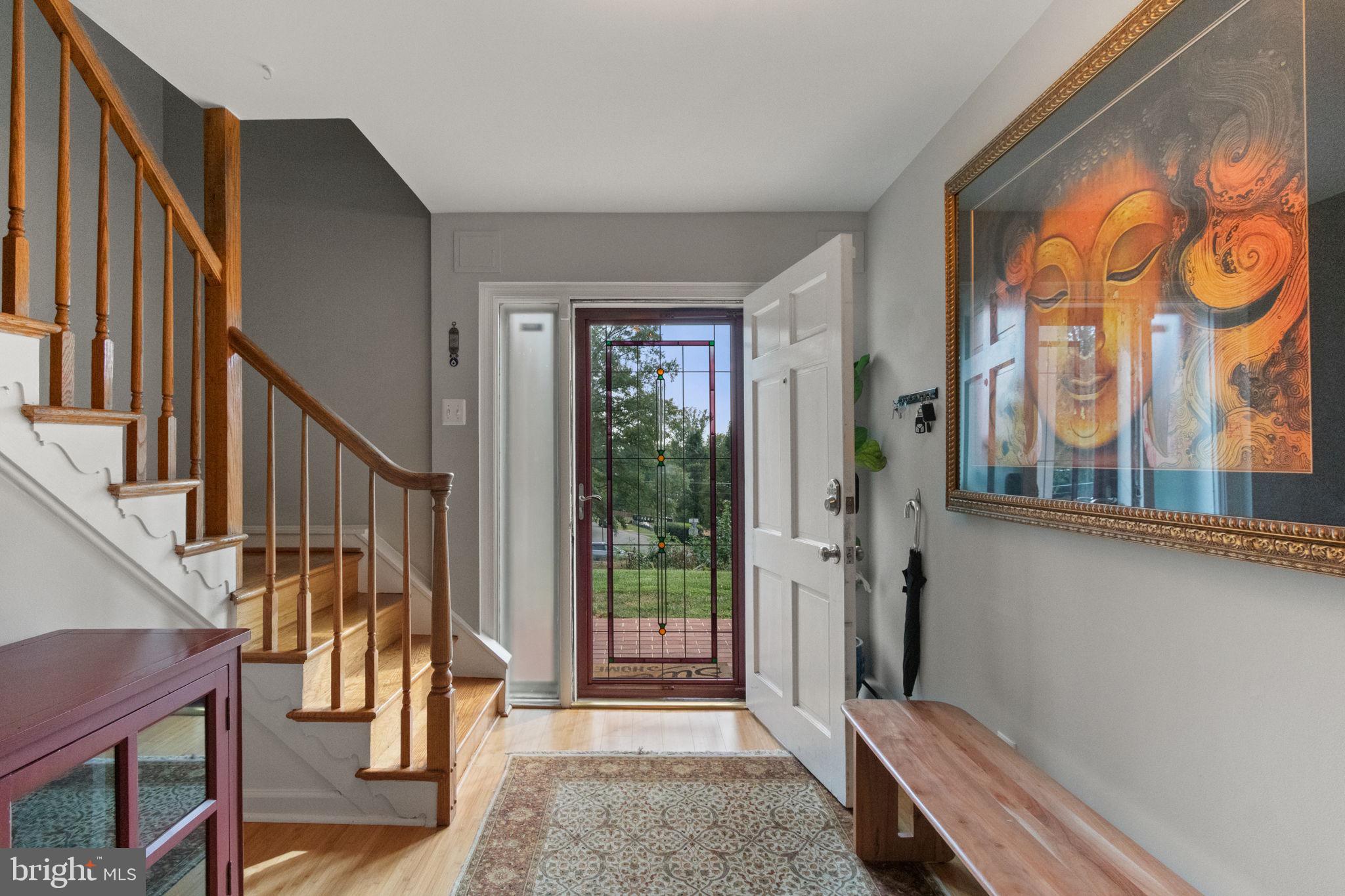 6700 Bulkley Road Lorton, VA 22079 - Photo 8 of 62 a view of an entryway with wooden floor and door