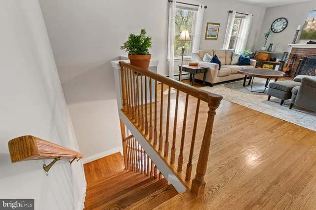 a kitchen with stainless steel appliances granite countertop a refrigerator and a stove