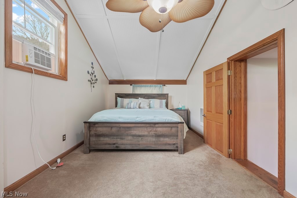 6939 Lakeview Road Hanoverton, OH 44423 - Photo 22 of 42 Bedroom featuring ceiling fan and carpet flooring