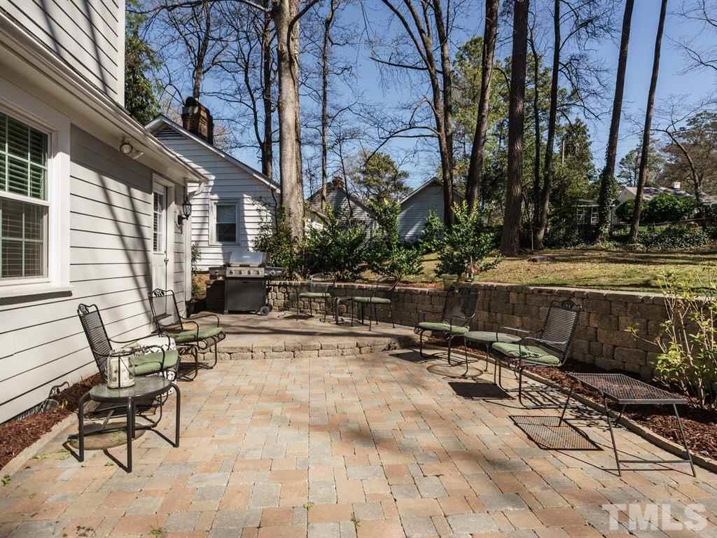 2807 Wayland Drive Raleigh, NC 27608 - Photo 20 of 24 a view of patio with chairs and tables
