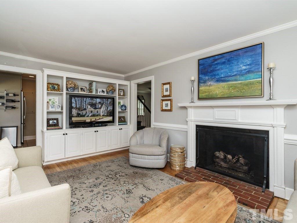 2807 Wayland Drive Raleigh, NC 27608 - Photo 8 of 24 a living room with furniture and a fireplace