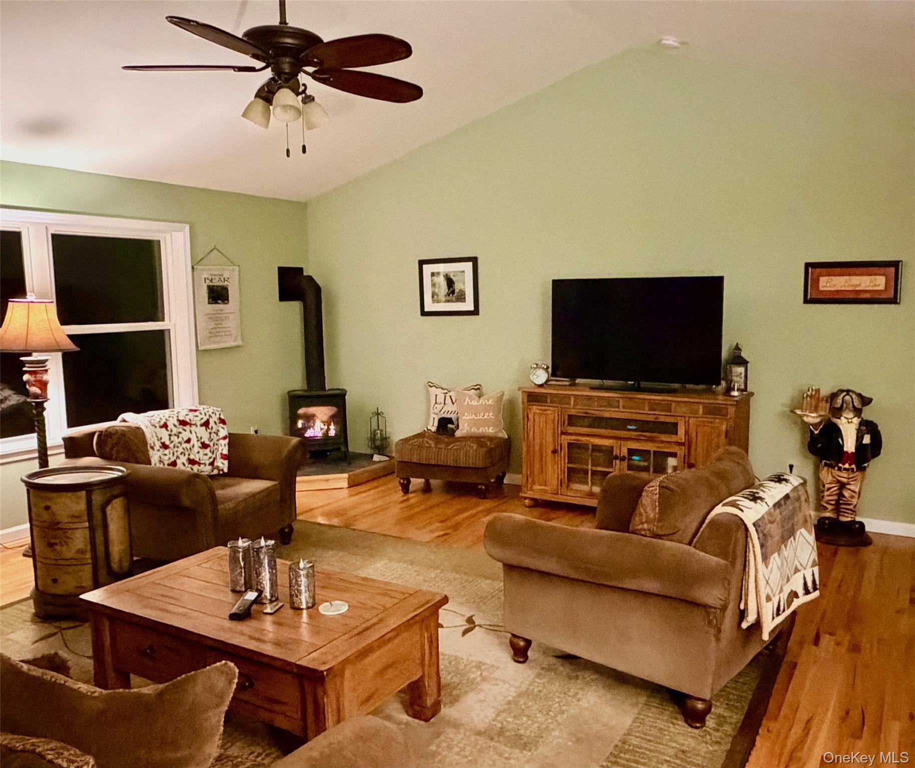 26 Valley Road Forestburgh, NY 12777 - Photo 15 of 33 a living room with furniture and a flat screen tv