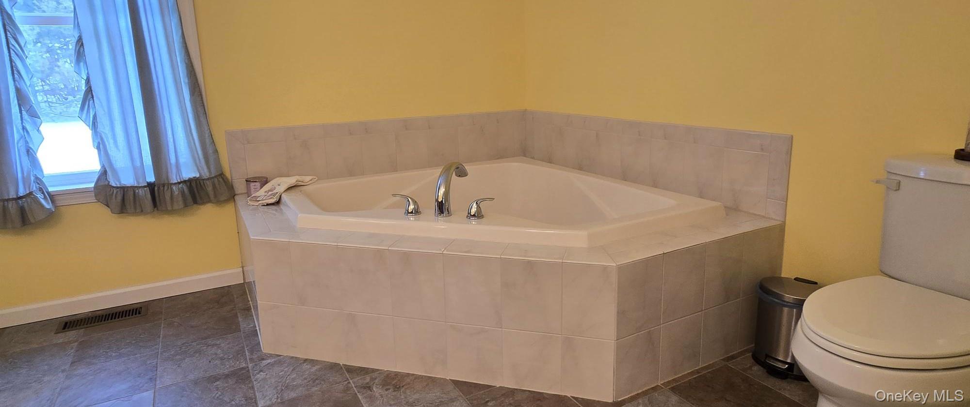 26 Valley Road Forestburgh, NY 12777 - Photo 27 of 33 a bathroom with a sink and a toilet