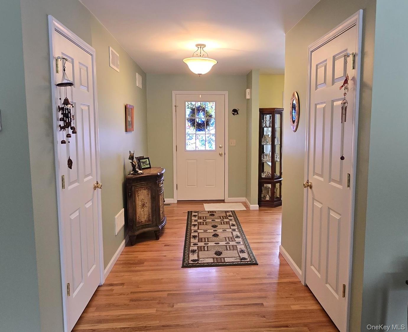 26 Valley Road Forestburgh, NY 12777 - Photo 10 of 32 a view of a hallway view with wooden floor and furniture