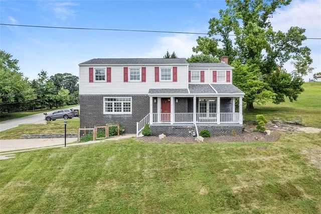 a house view with a garden space
