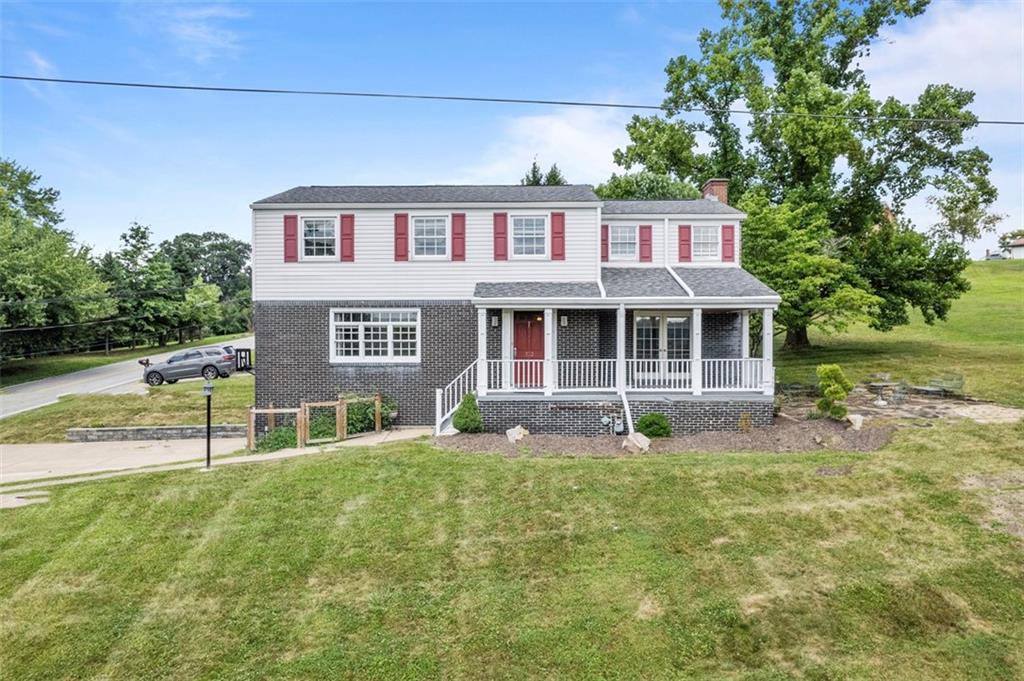a house view with a garden space