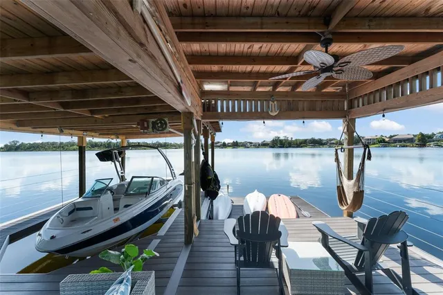 a kitchen with kitchen island a stove a sink and a refrigerator