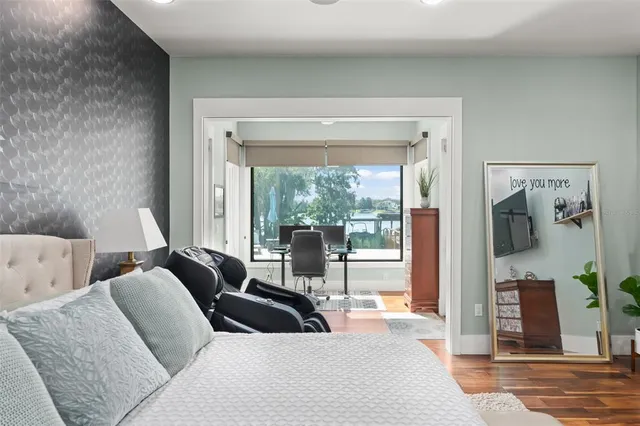 a room with furniture and a flat screen tv