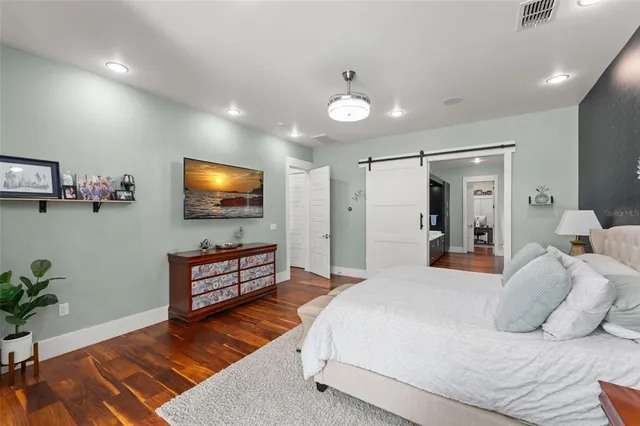 a room with gym equipment and a mirror